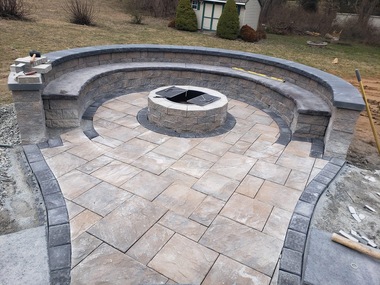 Block wall and paver steps. Outdoor seating area with retaining wall blocks and paver steps.