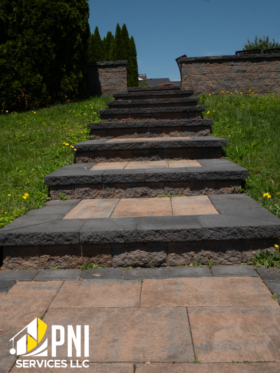 Paver steps with rock edging. Paver steps and walkway with decorative stone edging.